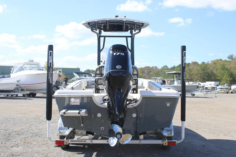 Slide: The Image of 2025 Carolina Skiff 21 Ultra Elite boat with 175 HP engine, parked on a trailer. - 3
