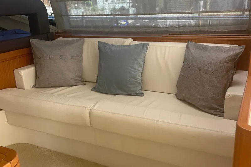 Slide: The Image of Luxurious interior of 2012 Ferretti Yachts 530 with elegant sofa and cushions. - 5