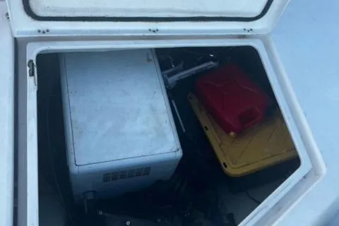 Slide: The Image of Storage compartment on a 2016 Leopard 48 yacht with various equipment inside. - 10