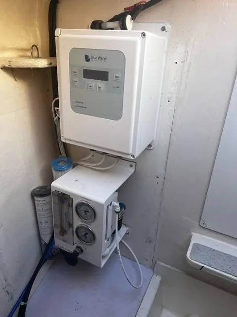 Slide: The Image of Water filtration system in a 2016 Leopard 48 yacht interior. - 13