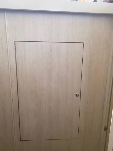 Slide: The Image of Wooden panel with a small door, Leopard 48 model, 2016. - 15