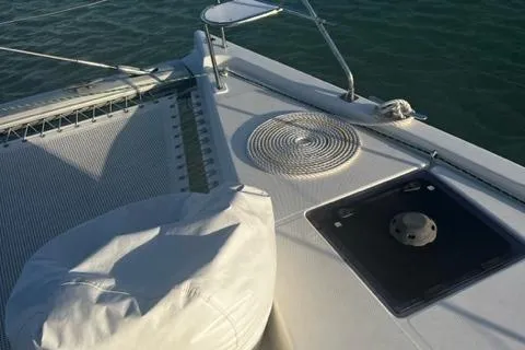 Slide: The Image of 2016 Leopard 48 yacht deck with seating, netting, and ocean view. - 4