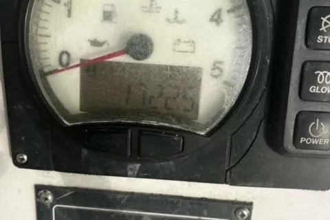 Slide: The Image of Close-up of a Leopard 48 yacht's gauge panel, showing engine hours. - 5