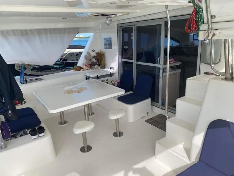 Slide: The Image of Spacious deck area of a 2016 Leopard 48 yacht with seating and table. - 9