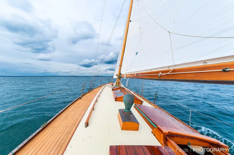 Slide: The Image of Sailing on a 1929 Herreshoff Fishers Island 31 yacht, open sea view. - 14