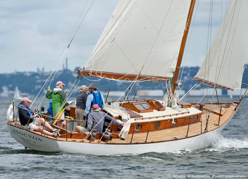Slide: The Image of Sailing on a 1929 Herreshoff Fishers Island 31 yacht with crew on deck. - 4