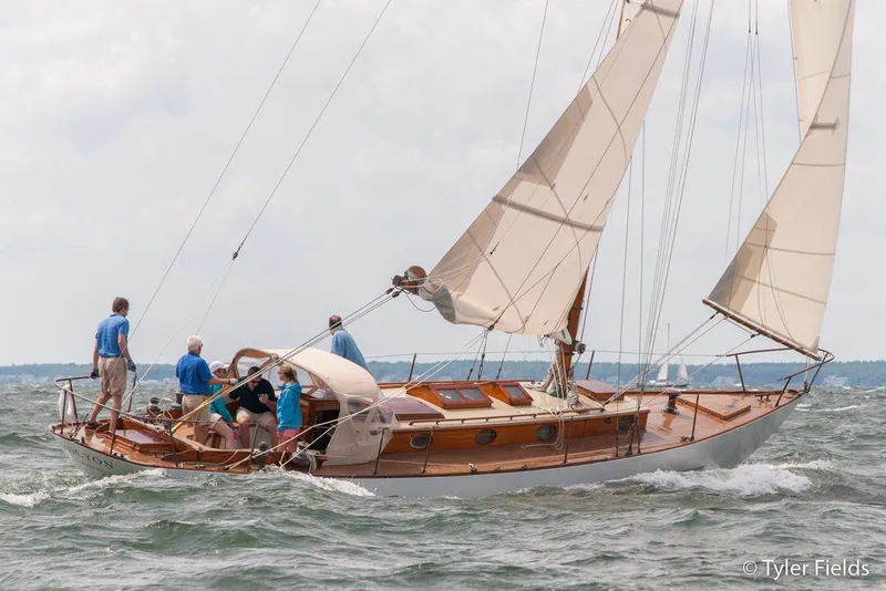 Slide: The Image of Sailing on a 1929 Herreshoff Fishers Island 31 yacht in choppy waters. - 6