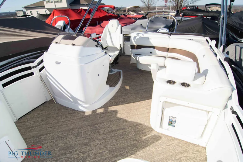 Slide: The Image of Interior of a 2022 JC NEPTOON 27 TT SPORT boat with seating and control console. - 15