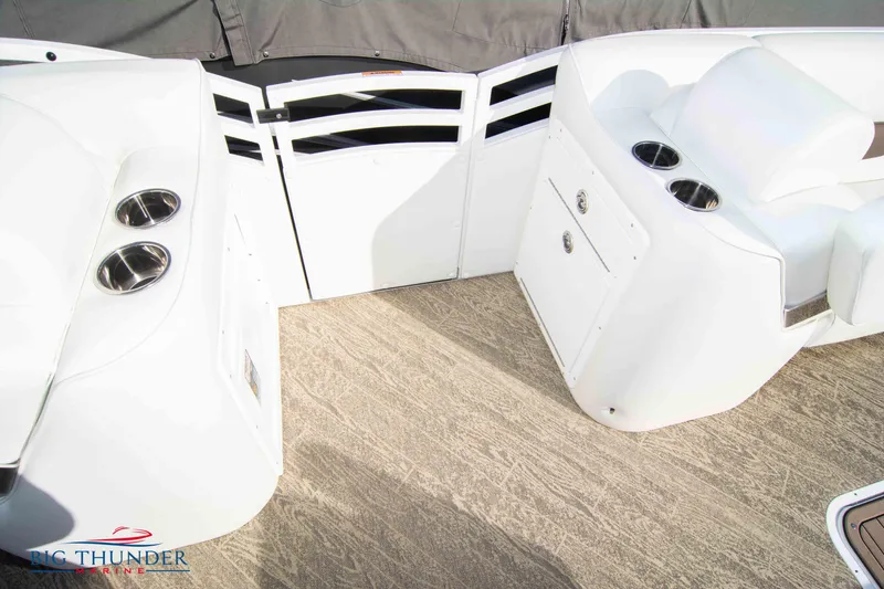 Slide: The Image of Interior of 2022 JC NEPTOON 27 TT SPORT boat with cup holders and storage compartments. - 16