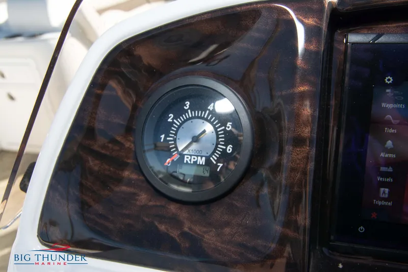 Slide: The Image of JC NEPTOON 27 TT SPORT 2022 RPM gauge on dashboard by Big Thunder Marine. - 27