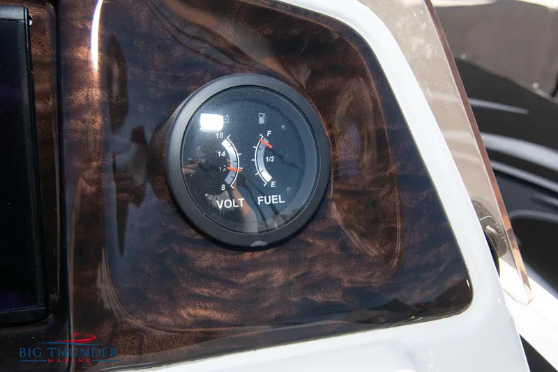 Slide: The Image of Close-up of the dashboard gauge on a 2022 JC NEPTOON 27 TT SPORT boat. - 28
