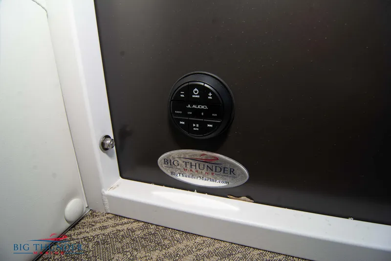 Slide: The Image of Control panel of JC NEPTOON 27 TT SPORT 2022 boat with Big Thunder Marine logo. - 43