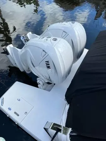 Slide: The Image of 2023 Regal 36 XO boat with twin Yamaha outboard engines. - 5