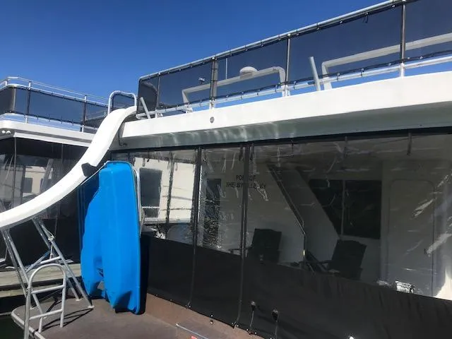 Slide: The Image of 2007 Thoroughbred houseboat with upper deck slide and clear enclosure. - 31