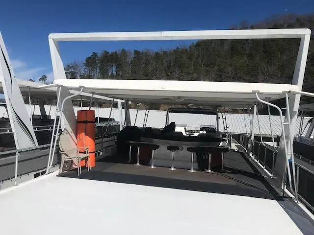 Slide: The Image of 2007 Thoroughbred houseboat with upper deck seating and canopy. - 32