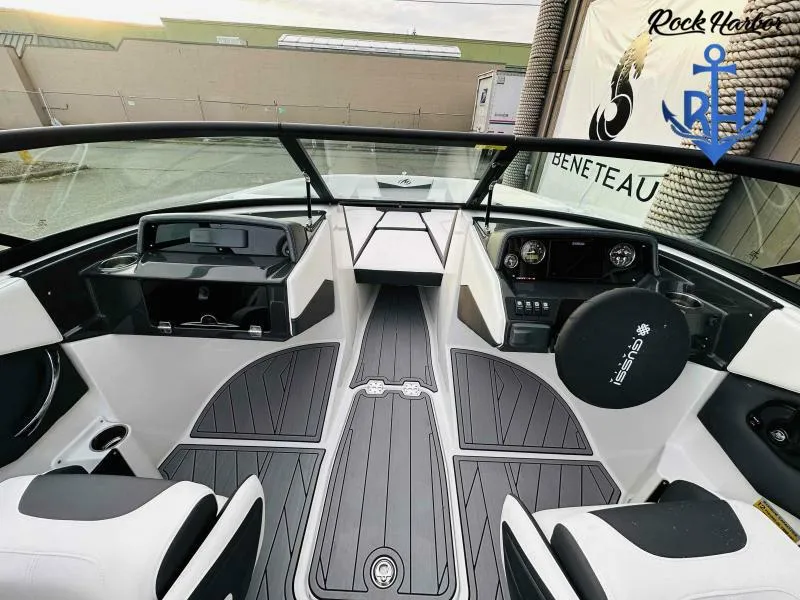 Slide: The Image of 2023 Monterey M-22 boat interior with modern dashboard and seating. - 31