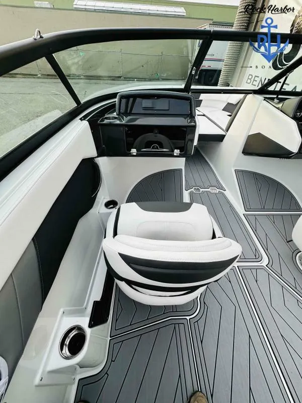 Slide: The Image of Interior of 2023 Monterey M-22 boat with modern dashboard and seating. - 33