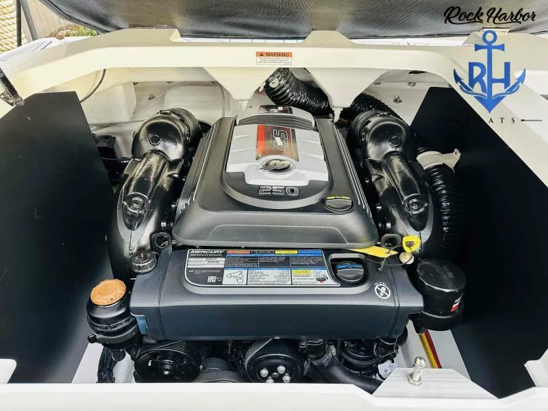 Slide: The Image of 2023 Monterey M-22 boat engine compartment with Mercury 250 HP engine. - 38
