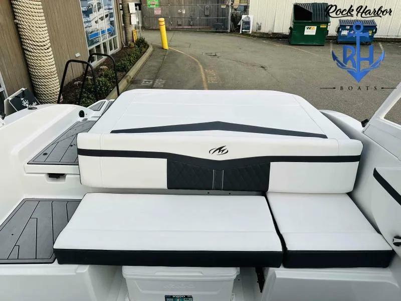 Slide: The Image of 2023 Monterey M-22 boat rear seating area at Rock Harbor Boats. - 40
