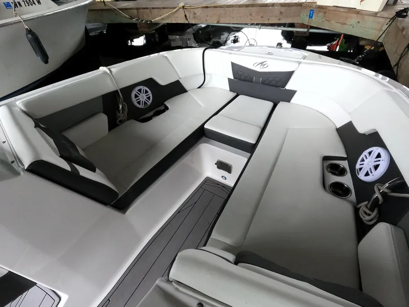 Slide: The Image of 2023 Monterey M-22 boat interior with spacious seating and built-in speakers. - 46