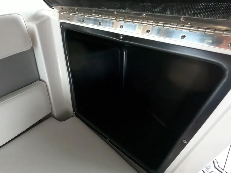 Slide: The Image of Storage compartment in 2023 Monterey M-22 boat, featuring sleek design and ample space. - 49
