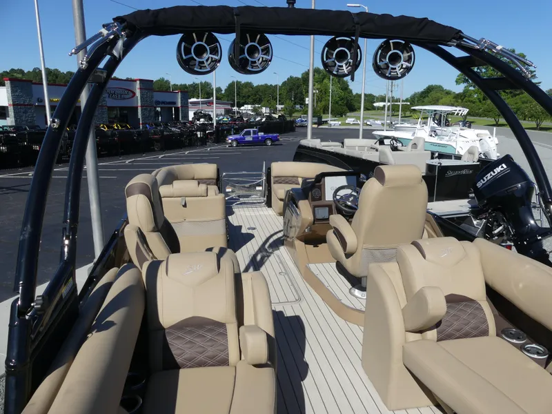 Slide: The Image of 2023 Silver Wave 2610 CLS SW7 pontoon boat with luxurious seating and modern amenities. - 17