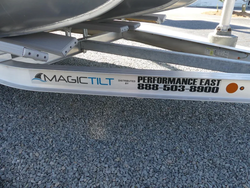 Slide: The Image of Magic Tilt boat trailer for 2023 Silver Wave 2610 CLS SW7, distributed by Performance East. - 24