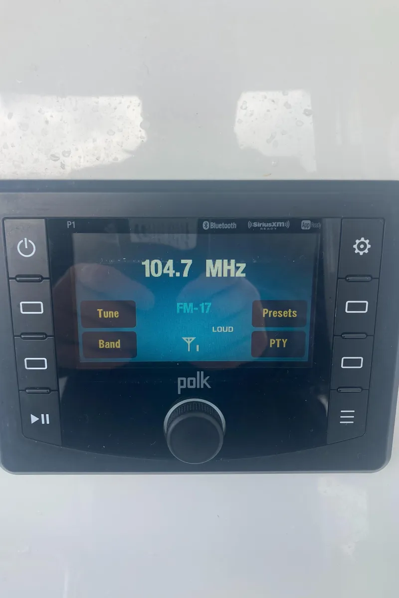 Slide: The Image of Polk audio system display on 2020 Regulator 23 Forward Seating boat. - 12