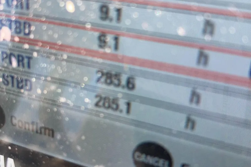 Slide: The Image of Close-up of a digital display on a 2020 Regulator 23 Forward Seating boat. - 6