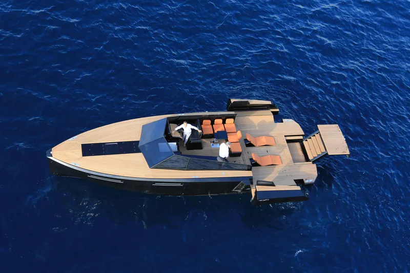 Slide: The Image of 2024 Evo Yachts R4 luxury yacht cruising on blue ocean waters. - 23