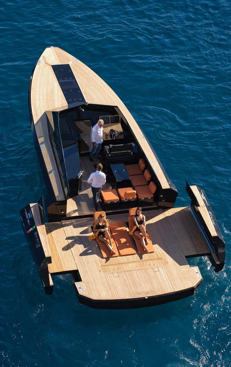 Slide: The Image of 2024 Evo Yachts R4 luxury yacht on open water. - 3