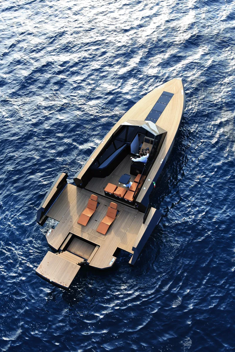 Slide: The Image of 2024 Evo Yachts R4 luxury yacht cruising on open water. - 5