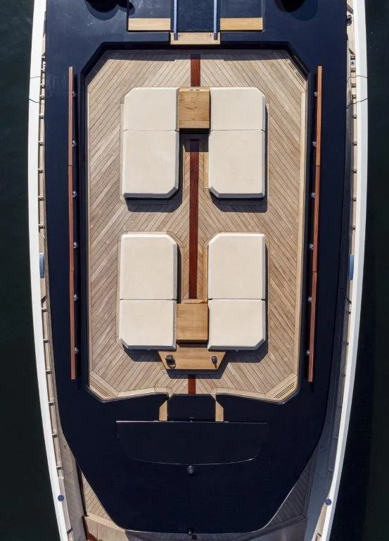 Slide: The Image of Top view of 2025 Evo Yachts V8 deck with luxurious seating arrangement. - 14