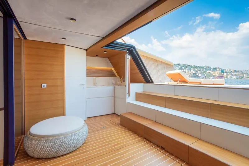 Slide: The Image of Luxurious interior of 2025 Evo Yachts V8 with modern seating and scenic ocean view. - 29