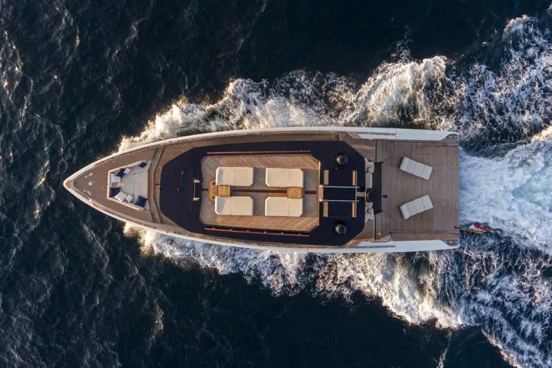 Slide: The Image of Aerial view of 2025 Evo Yachts V8 luxury yacht cruising on the ocean. - 3