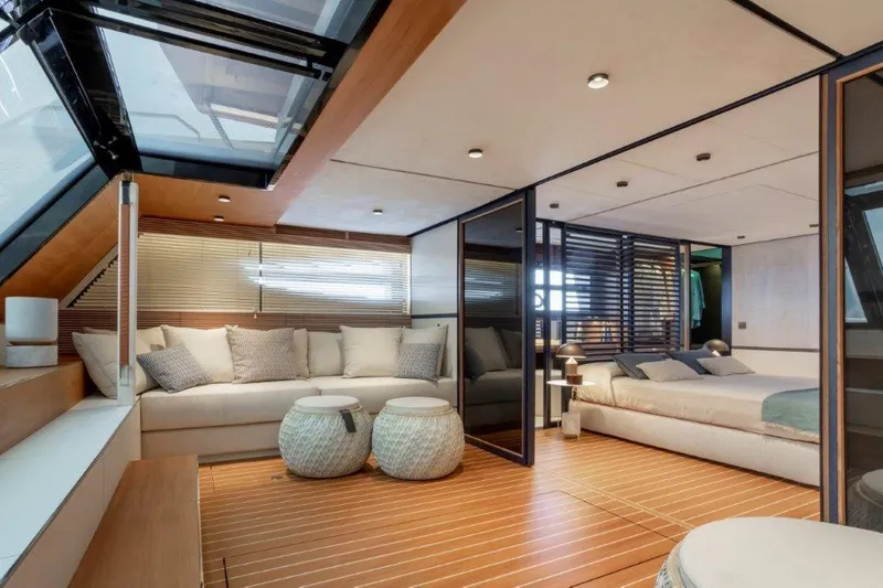Slide: The Image of Luxurious interior of 2025 Evo Yachts V8 with modern furnishings and wooden flooring. - 33