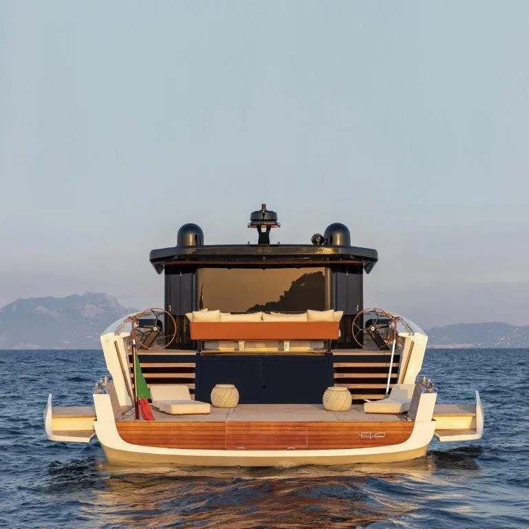 Slide: The Image of 2025 Evo Yachts V8 luxury yacht on open water. - 8