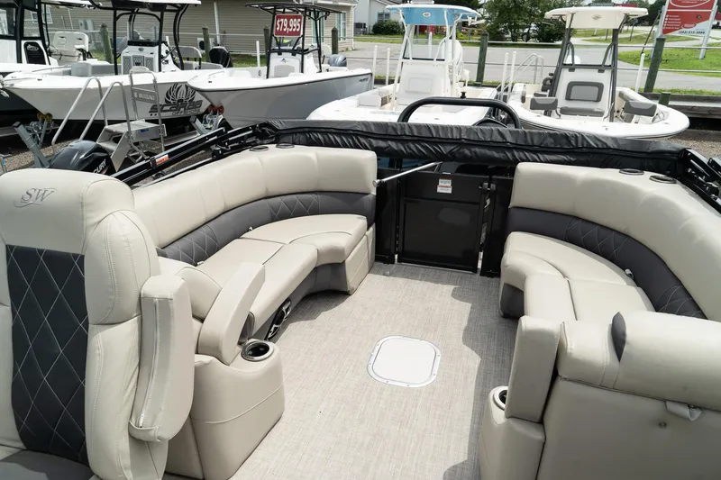 Slide: The Image of 2023 Silver Wave 2410 SW3 CLS pontoon boat with spacious seating and modern design. - 14