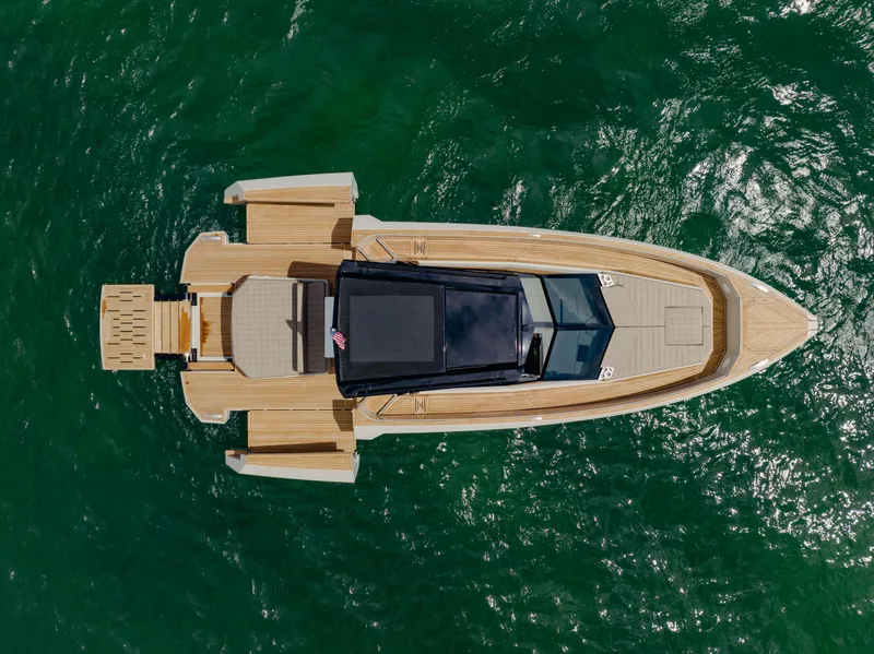 Slide: The Image of Aerial view of 2024 Evo Yachts R4 WA luxury yacht on the water. - 18