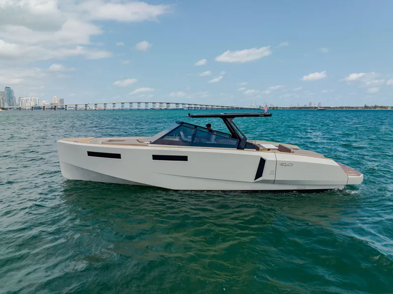 Slide: The Image of 2024 Evo Yachts R4 WA luxury yacht cruising on open water. - 27