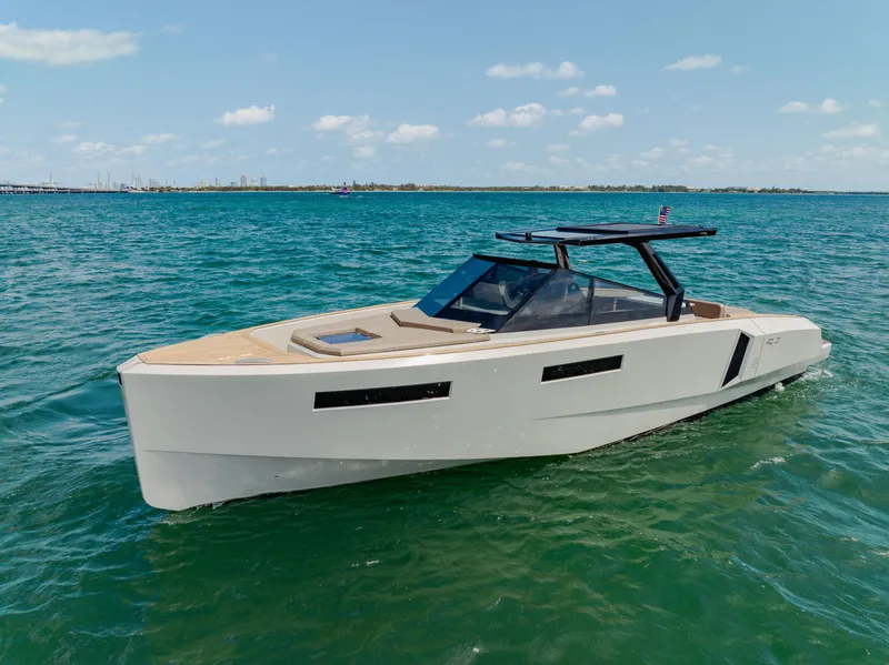 Slide: The Image of 2024 Evo Yachts R4 WA luxury yacht cruising on open water. - 28