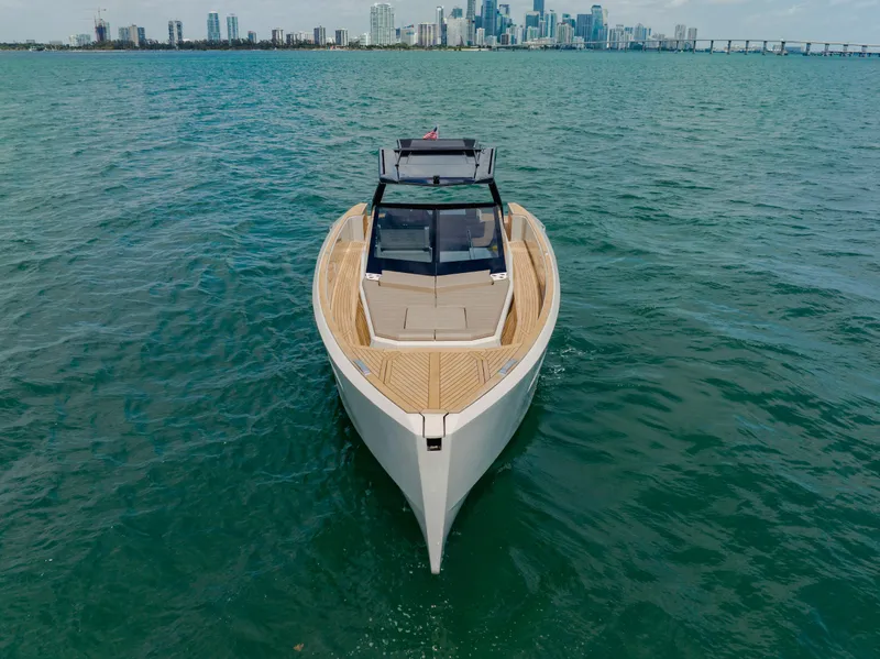 Slide: The Image of 2024 Evo Yachts R4 WA luxury yacht cruising on open water. - 3