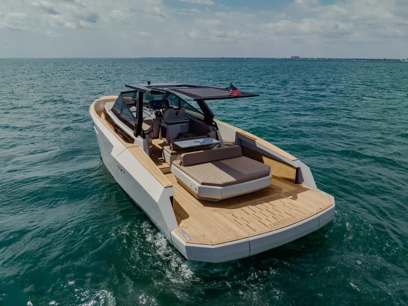 Slide: The Image of 2024 Evo Yachts R4 WA luxury yacht cruising on open water. - 5