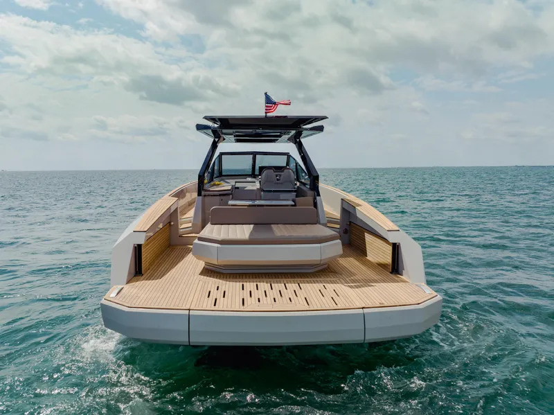 Slide: The Image of 2024 Evo Yachts R4 WA luxury yacht on open water. - 7