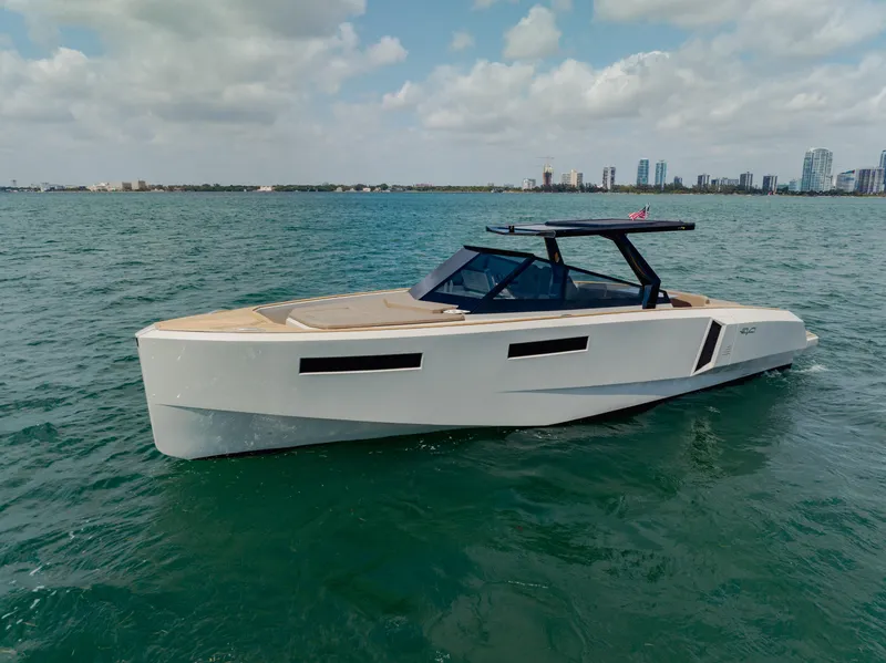 Slide: The Image of 2024 Evo Yachts R4 WA luxury yacht cruising on open water. - 8