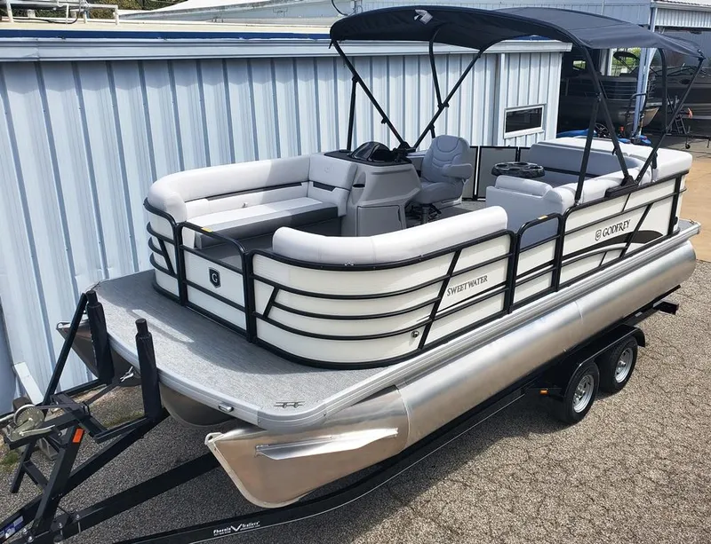 Slide: The Image of 2023 Sweetwater 2086 C pontoon boat with canopy on trailer. - 0