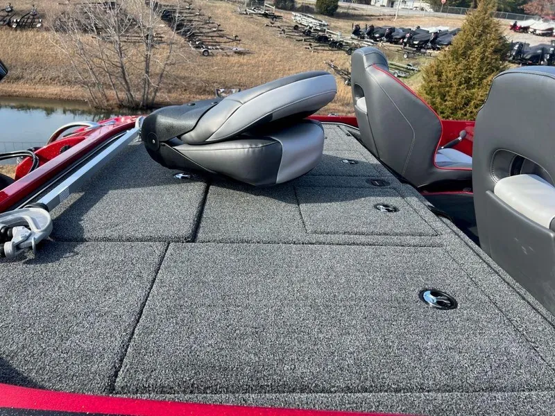 Slide: The Image of Nitro Z20 Pro 2023 boat deck with folded seats and storage compartments. - 12