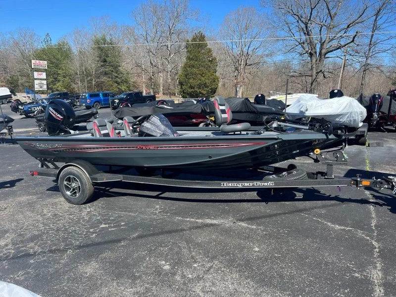 Slide: The Image of 2023 Ranger RT178C fishing boat on trailer in outdoor lot. - 3