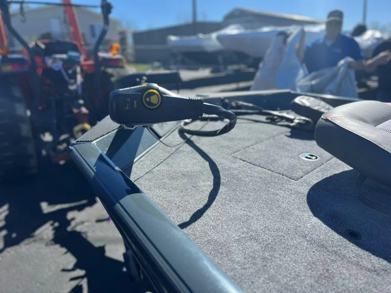 Slide: The Image of 2023 Ranger RT178C boat deck with control panel and seat. - 6