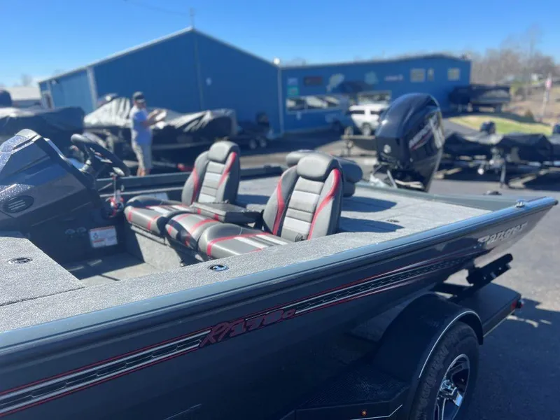Slide: The Image of 2023 Ranger RT178C fishing boat with dual seats and outboard motor. - 7